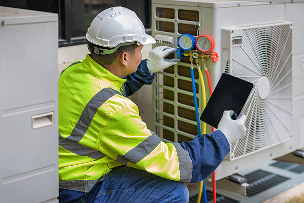 Professional Ductwork Repair technician working in Malone, WI